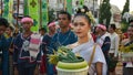 Thai girl in Thai traditional dress, she look at to camera.